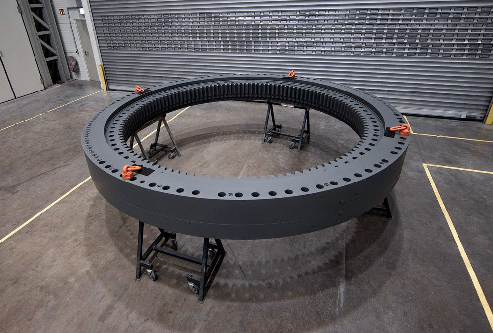 Brand new aftermarket slewing bearing for a Liebherr excavator.