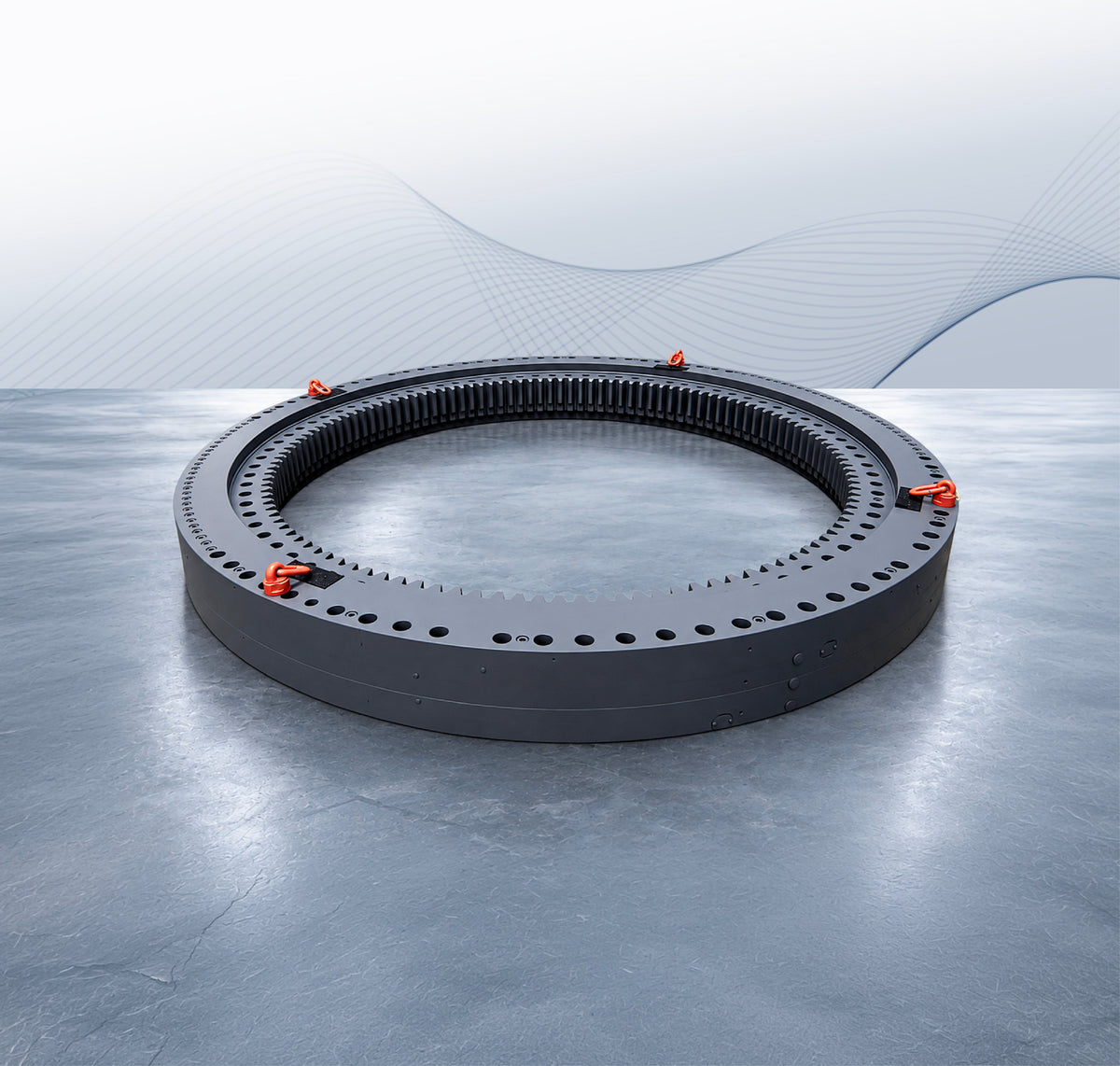 Large slewing bearing with internal gear teeth, mounting holes and red lifting points.